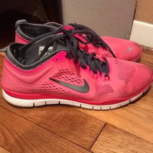 Hot pink Nike sneakers